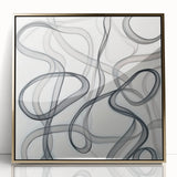 Abstract geometric design framed in acrylic with gold accents, showcasing a modern artistic style suitable for contemporary home decor. The piece features intricate shapes and vibrant colors, adding sophistication to any space.