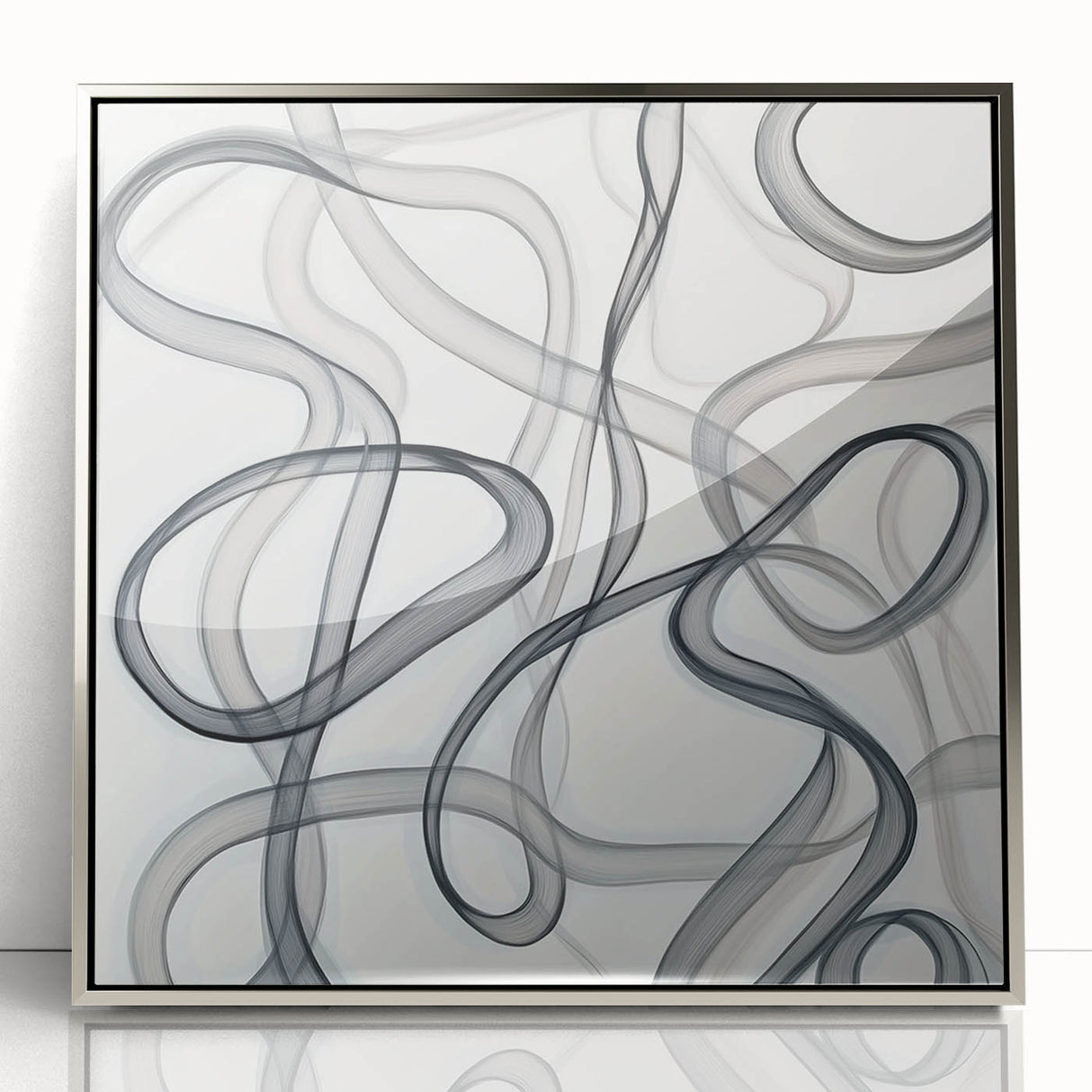 Framed abstract geometric artwork in silver acrylic, showcasing intricate patterns and sleek lines, perfect for modern home decor. Ideal for adding a contemporary touch to living spaces.