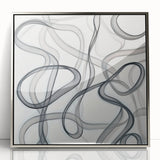 Framed abstract geometric artwork in silver acrylic, showcasing intricate patterns and sleek lines, perfect for modern home decor. Ideal for adding a contemporary touch to living spaces.