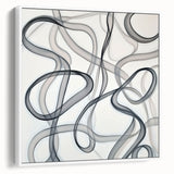 Framed canvas artwork showcasing an abstract geometric design in white, viewed from the side, emphasizing its modern aesthetic and elegant frame, perfect for contemporary home decor.