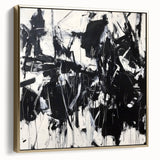 Framed canvas artwork showcasing an abstract design with silver and gold splatters on a textured surface, ideal for modern home decor. The elegant color palette adds sophistication to any living space.