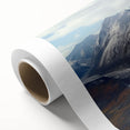 Art deco poster of Yukon scenery in muted green and blue tones on rolled canvas.