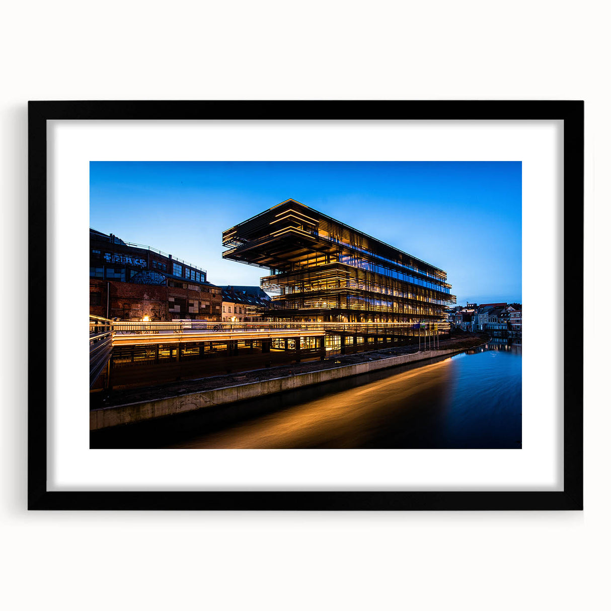 Extra large colorful abstract art print of a European scenery, textured on a black framed mat, ideal for living room decor.