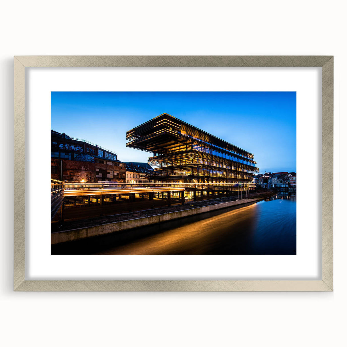 Extra large abstract art print of a European scenery in muted tones on a silver-framed canvas, ideal for living room decor.