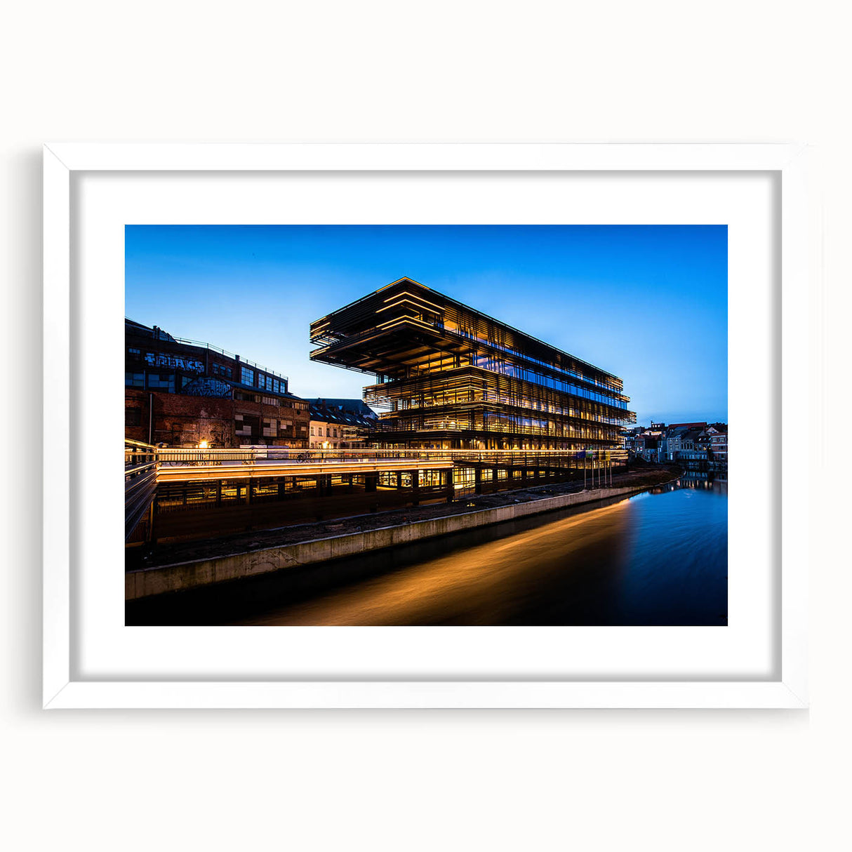 Textured abstract art print of a European scenery in muted earth tones on a white matted frame, ideal for bedroom art.