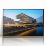 Art Deco style poster of a European cityscape in gold and black tones, acrylic print framed.