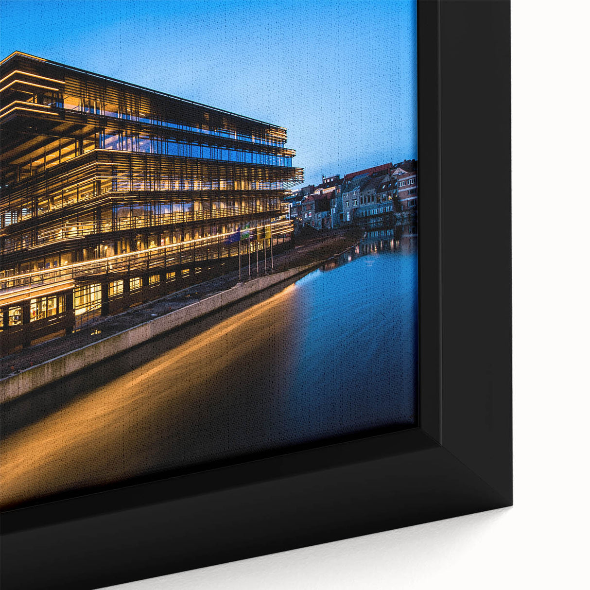 Extra large black wall art depicting a textured European cityscape in vibrant colors, ideal for living room decor.