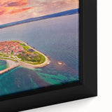 Close-up of extra large framed canvas depicting a textured black wall art scene with colorful, abstract elements.