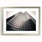 Extra large abstract art print of the London skyline in muted gray and silver tones on a textured canvas.