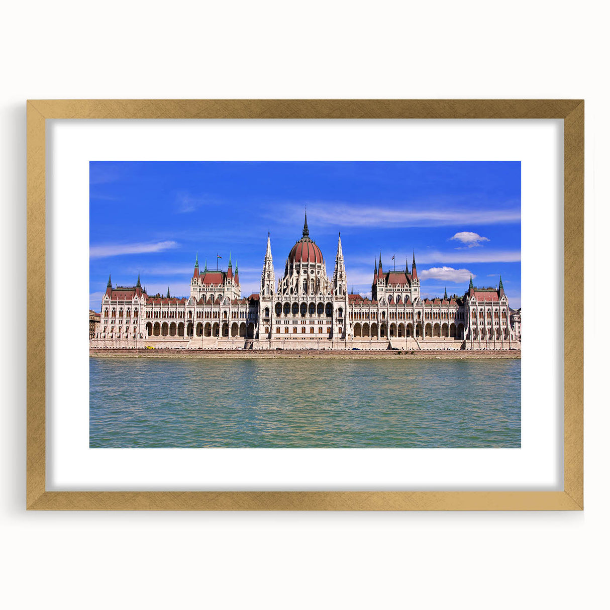Abstract art print of a European landscape in muted gold and green tones, framed with a golden mat.
