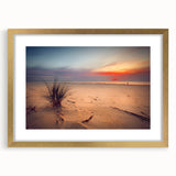 Abstract art print of a European landscape in muted gold and blue tones, framed with a gold mat.