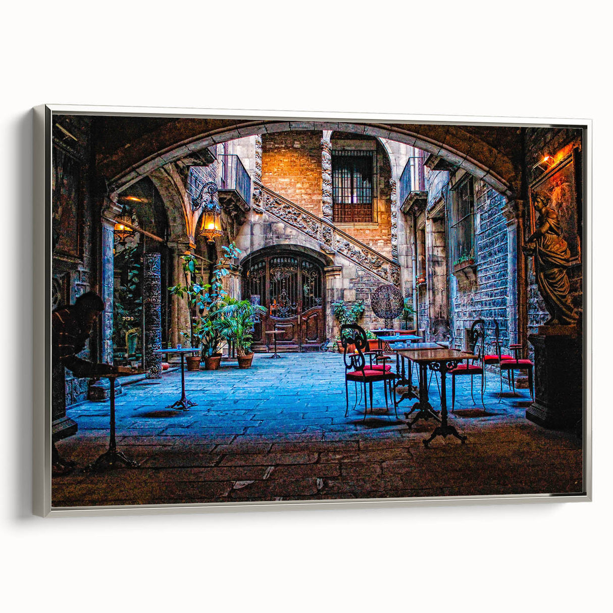 Landscape art painting of Barcelona skyline in colorful hues on a silver-framed canvas, ideal for living room decor.
