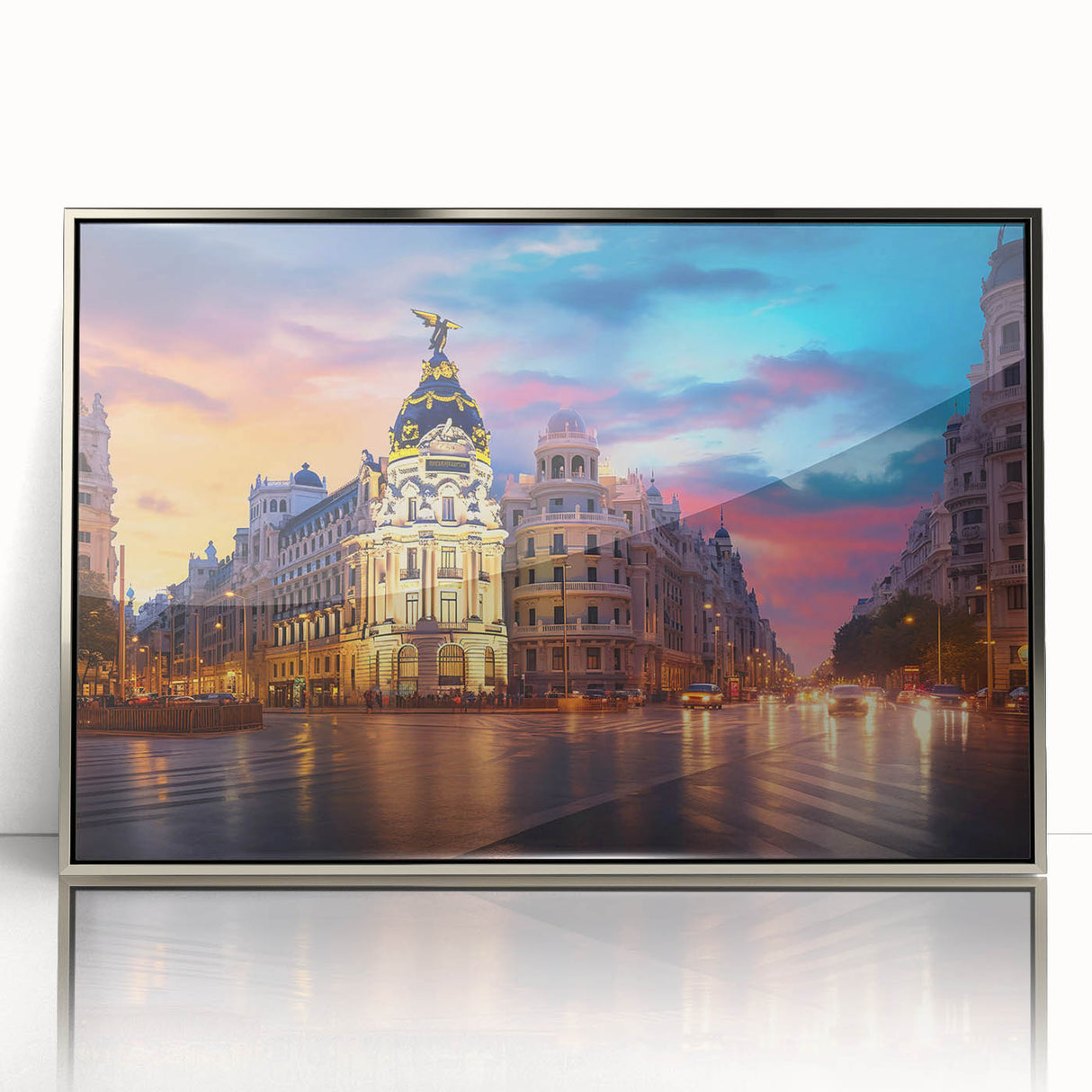 Mid-century modernist art depicting Madrid's skyline in muted gray and blue tones on a silver-framed acrylic print.
