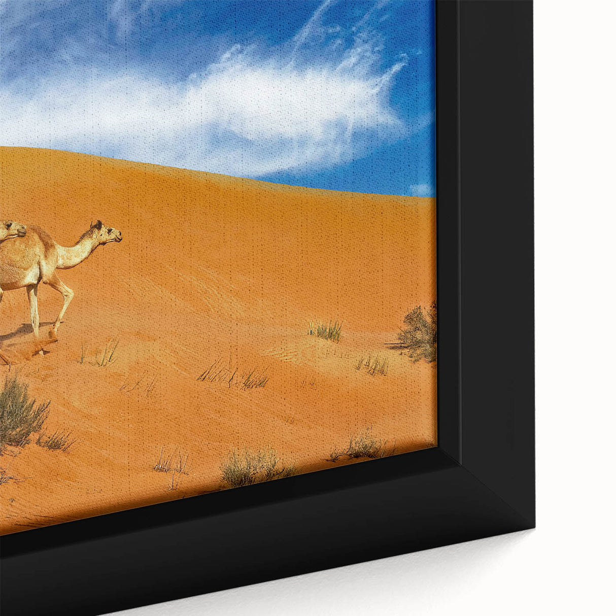 Textured black wall art depicting a Middle Eastern scene on framed canvas, featuring colorful accents.