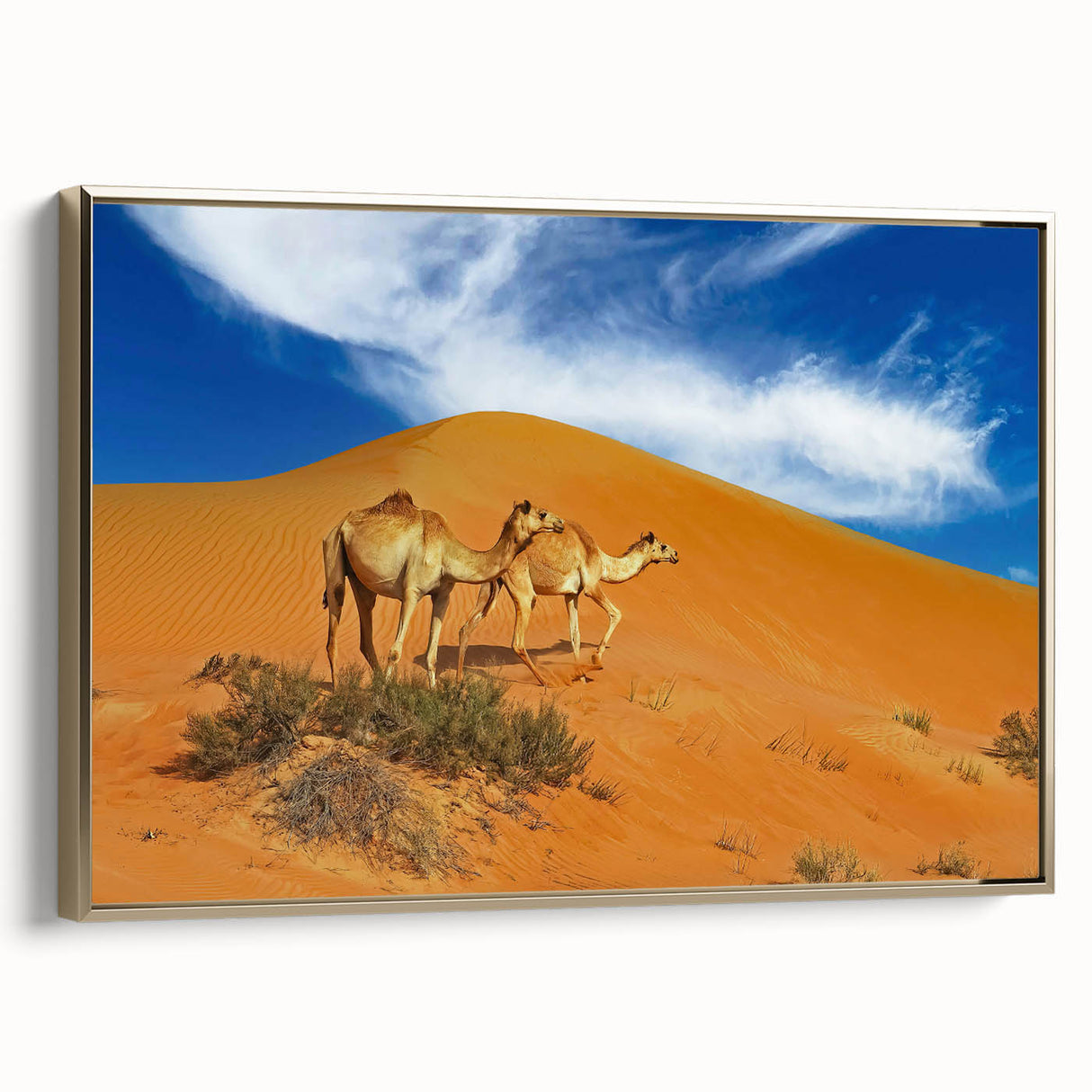 Framed canvas wall art featuring a vintage-style landscape of Oman in muted gold and black tones, ideal for bedroom decor.
