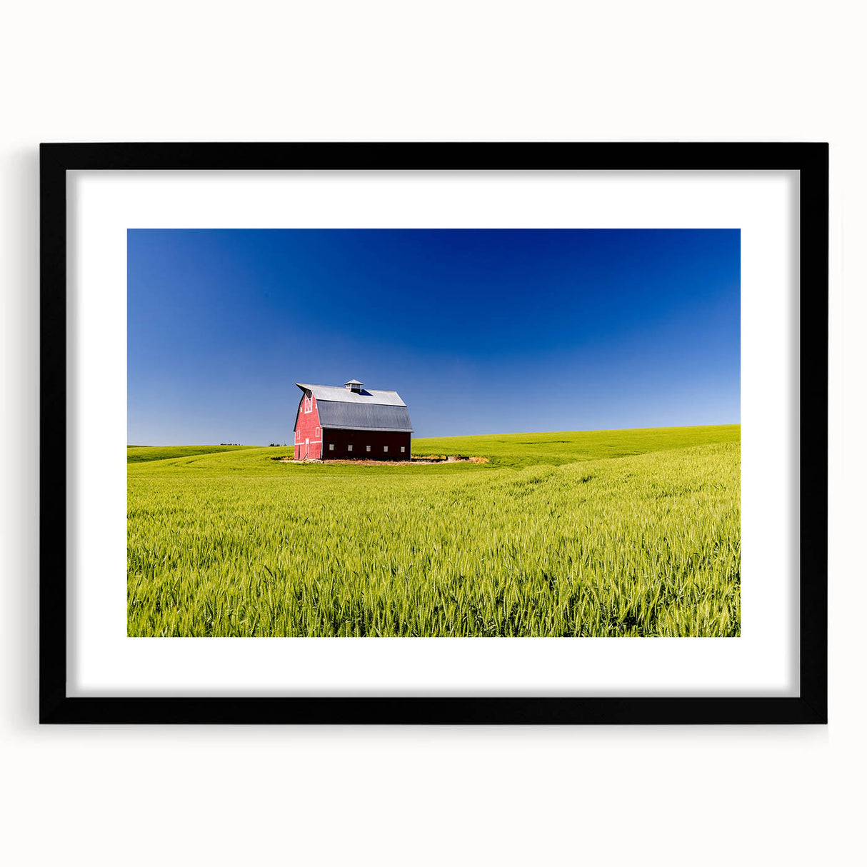 Colorful abstract art print of a textured Idaho scenery on an extra large canvas, framed in black.