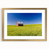 Extra large abstract art print of Idaho scenery in muted earth tones on a textured canvas, framed in gold.