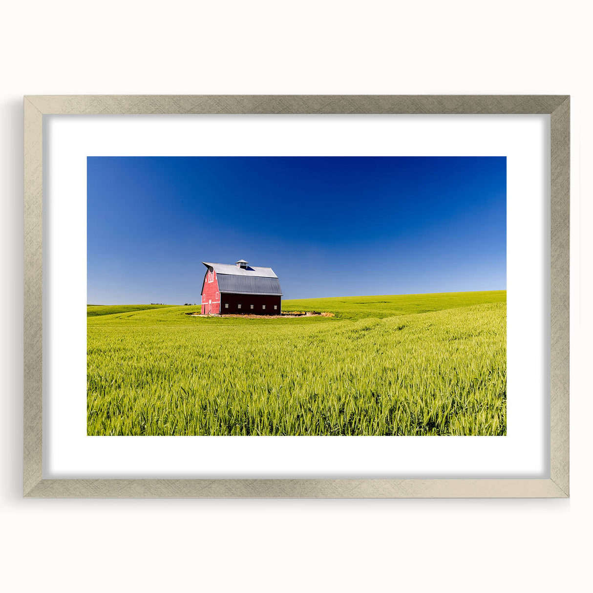 Textured abstract art print of Idaho scenery in muted earth tones, framed in silver, ideal for bedroom decor.