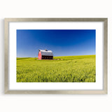 Textured abstract art print of Idaho scenery in muted earth tones, framed in silver, ideal for bedroom decor.