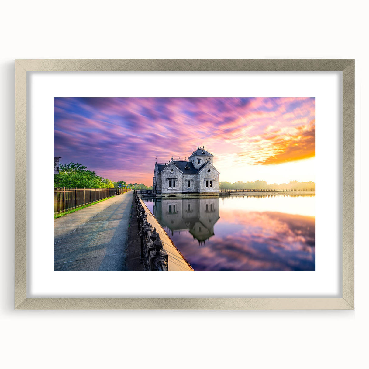 Textured abstract art print of Kentucky scenery in muted earth tones, framed in silver, suitable for bedroom decor.
