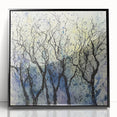 Framed black acrylic artwork showcasing an abstract floral design with vibrant colors, ideal for modern home decor or office spaces.