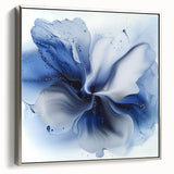Framed abstract floral canvas artwork with a silver frame, showcasing vibrant colors and intricate designs, perfect for modern home decor.