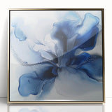 Framed acrylic artwork showcasing a vibrant abstract floral design with gold accents, set against a modern backdrop, perfect for contemporary home decor.