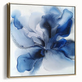 Framed canvas artwork featuring an abstract floral design in silver and gold hues, elegantly displayed against a neutral background, perfect for modern interior decor.