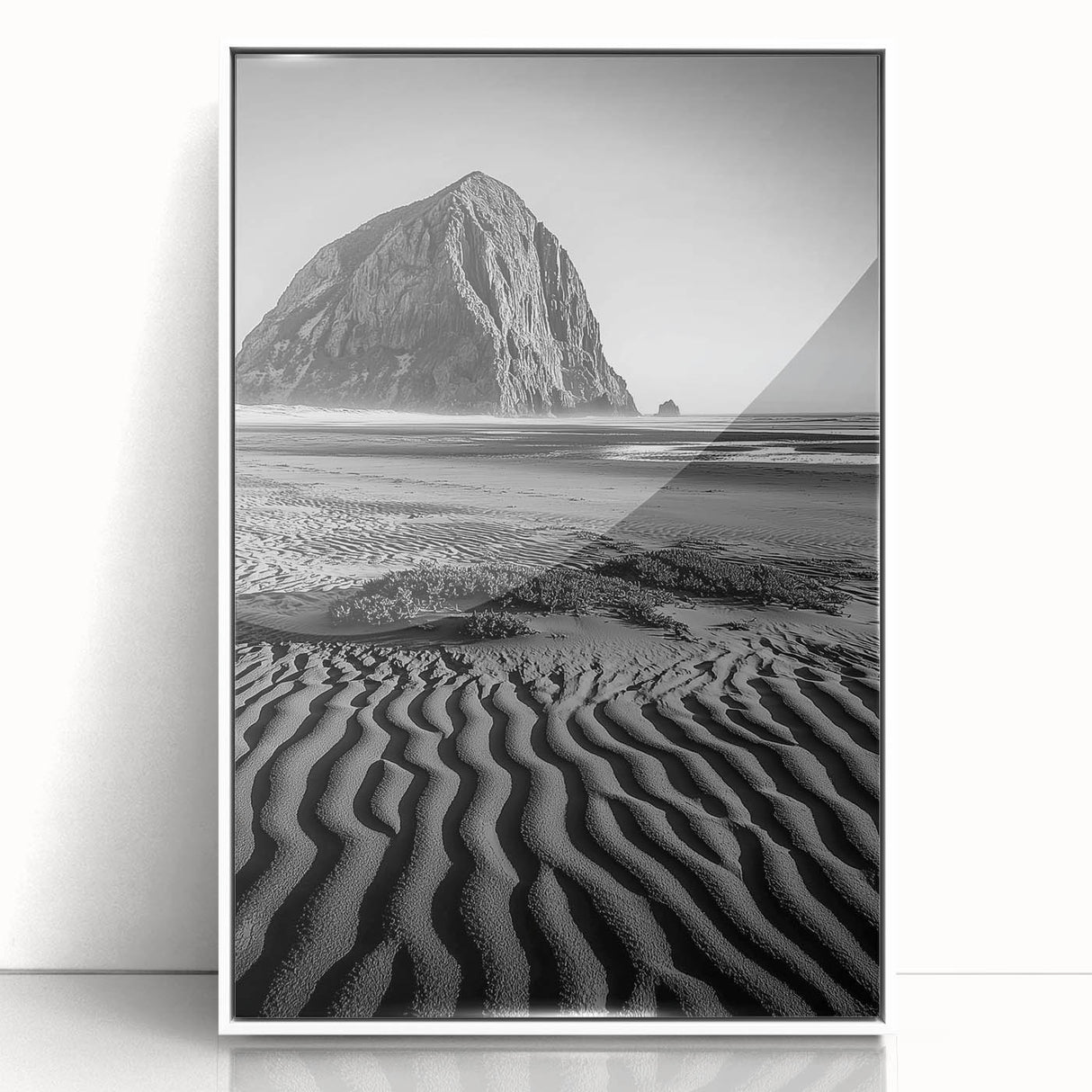 Framed acrylic artwork showcasing serene sand dunes in soft beige and white tones, set against a minimalistic white background, perfect for modern decor.