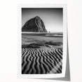Desert landscape print showcasing vibrant, undulating sand dunes in warm, earthy tones, rolled and ready for display, enhancing your home decor.