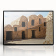Large abstract wall art depicting a Moroccan landscape in muted earth tones on a framed acrylic.