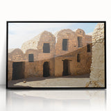 Large abstract wall art depicting a Moroccan landscape in muted earth tones on a framed acrylic.