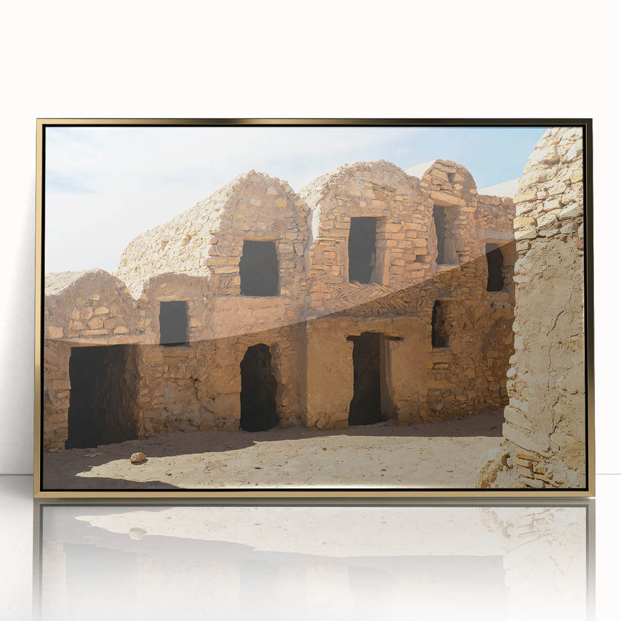Art deco poster of a Moroccan landscape in gold tones on framed acrylic, suitable for modern art wall decor.
