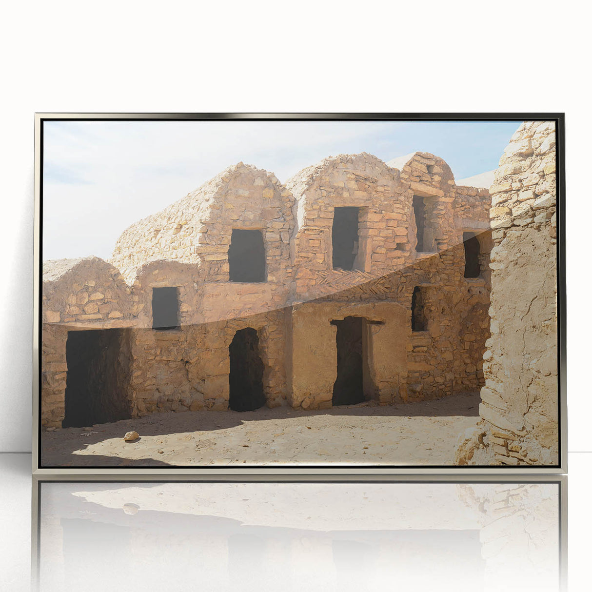 Framed acrylic print of a Moroccan landscape in muted earth tones, ideal for modern art wall decor.