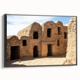 Black and white framed canvas of a Moroccan landscape, ideal for bedroom wall art, featuring vintage poster style.