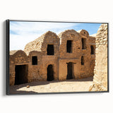 Black and white framed canvas of a Moroccan landscape, ideal for bedroom wall art, featuring vintage poster style.