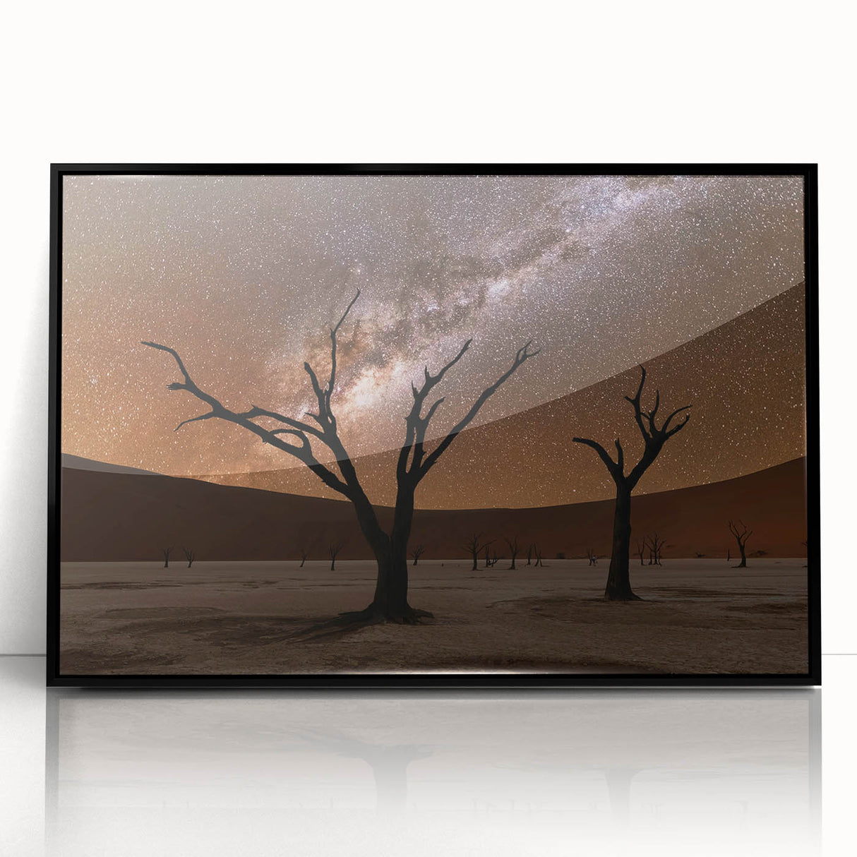 Large abstract wall art depicting a Namibian landscape in muted earth tones, framed in black acrylic.