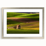 Extra large abstract art print of a textured European scenery in muted earth tones, framed in silver.