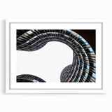 Textured abstract art print depicting a serene European landscape in muted earth tones, framed with a white mat.