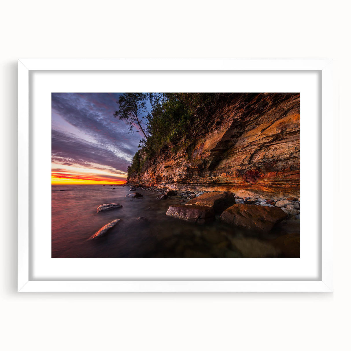 Textured abstract art print depicting a serene Finnish landscape in muted earth tones, framed with a white mat.