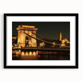 Extra large abstract art print of a colorful European scenery in a black frame, ideal for living room decor.