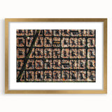 Abstract art print of Barcelona with vibrant hues on a gold-framed mat, ideal for dining room decor.