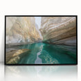 Large abstract wall art depicting a Middle Eastern scenery in muted earth tones, framed in black acrylic.