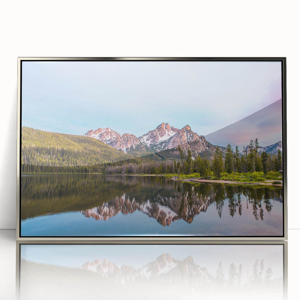 Mid-century modernist art depicting Idaho scenery in muted earth tones on a silver-framed acrylic print.