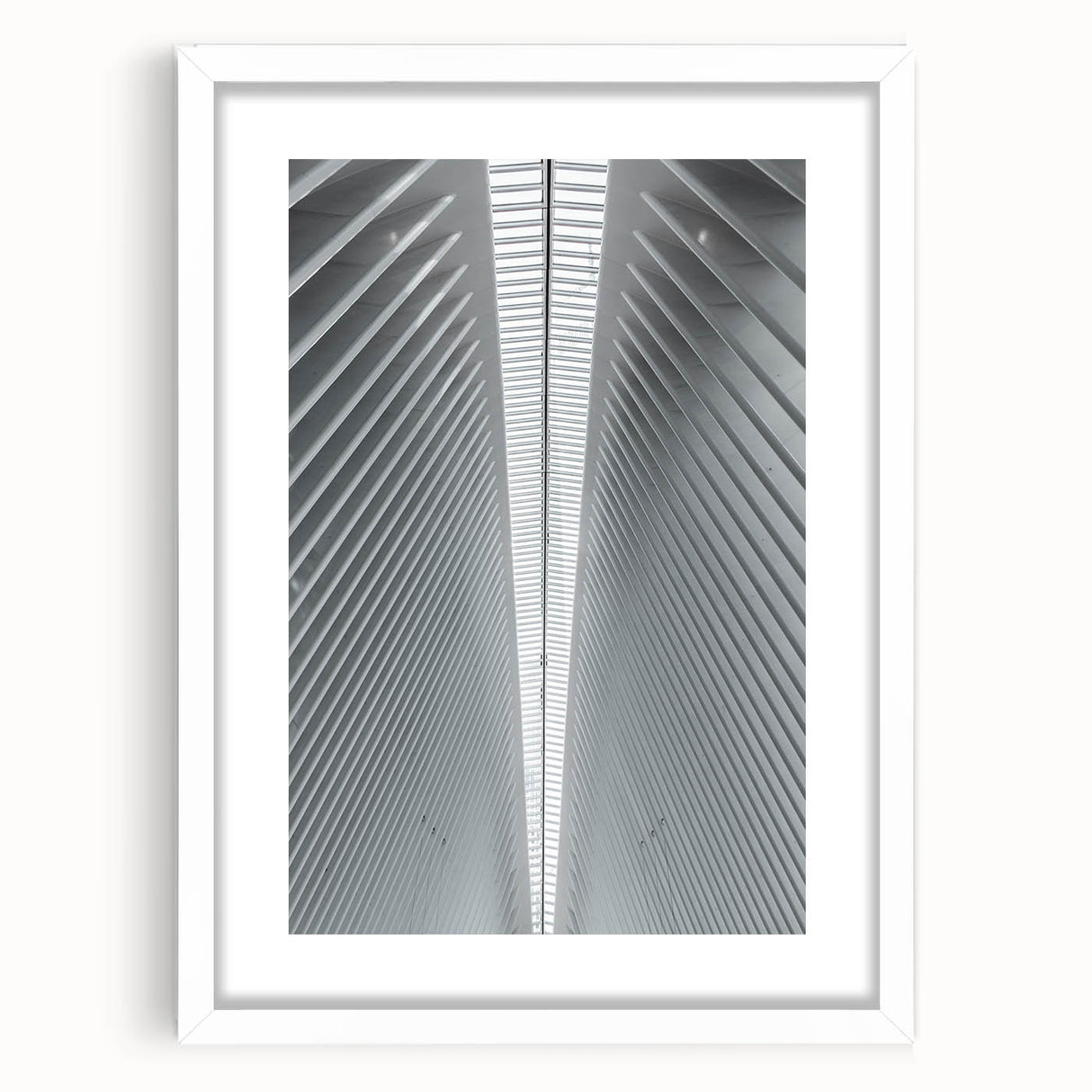 Abstract art print of Seattle skyline in muted gray and blue tones on a framed white mat.