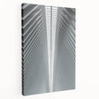Side view of a large stretched canvas featuring a detailed Seattle skyline in muted blue and gray tones.