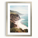 Textured abstract art print in silver frame, featuring swirling gray and white patterns, ideal for modern bedroom decor.