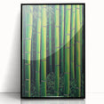 Framed acrylic artwork showcasing vibrant abstract floral designs in shades of pink, blue, and green, set in a sleek black frame, perfect for modern decor.