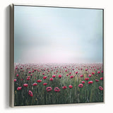 Framed canvas artwork showcasing abstract floral designs in vibrant colors, accented with a sleek silver frame, ideal for modern home decor aesthetics.