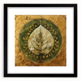Framed wall art featuring a botanical design with colorful flowers and leaves, set in a sleek black frame with a mat, ideal for home decor.